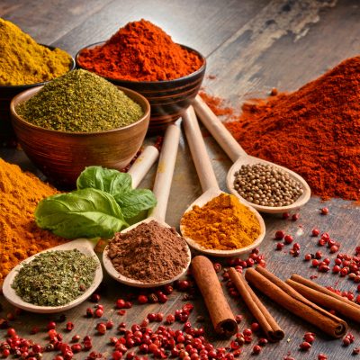 Variety of spices on kitchen table.